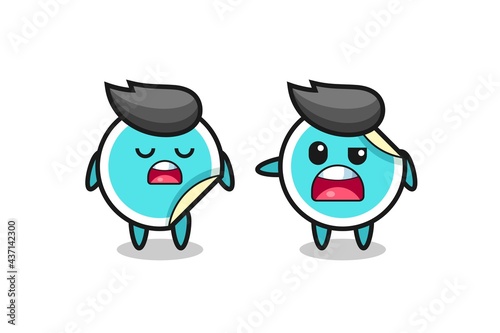 illustration of the argue between two cute sticker characters © heriyusuf