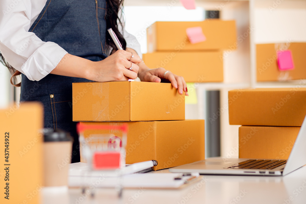 Starting small businesses SME owners female entrepreneurs Write the address on receipt box and check online orders to prepare to pack the boxes, sell to customers, sme business ideas online.
Starting small businesses SME owners female entrepreneurs Write the address on receipt box and check online orders to prepare to pack the boxes, sell to customers, sme business ideas online.