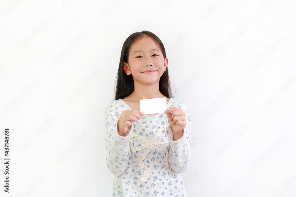 Happy Asian little girl child showing white card isolated on white background Happy Asian little girl child showing white card isolated on white background