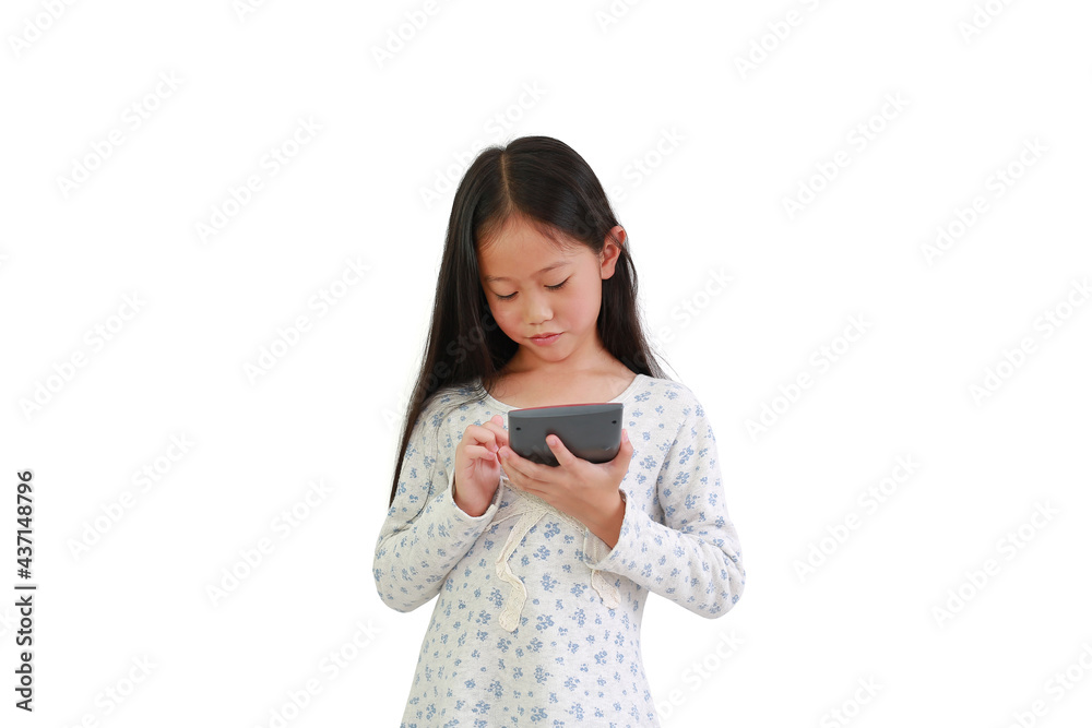 Cute Asian little child girl using calculator over white background. Education concept Cute Asian little child girl using calculator over white background. Education concept