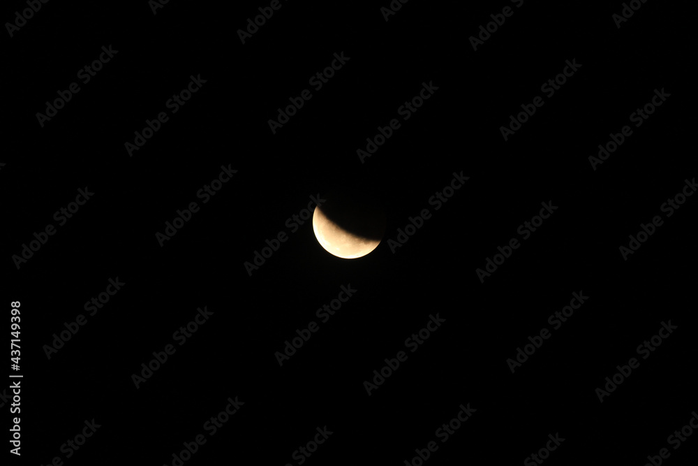 beautiful and serene view of the moon during the lunar eclipse. beautiful and serene view of the moon during the lunar eclipse.