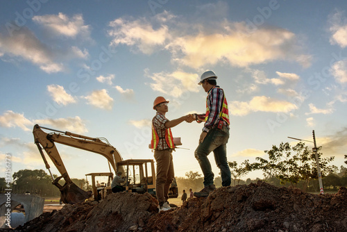 Engineers discussion with architects work planing in construction site