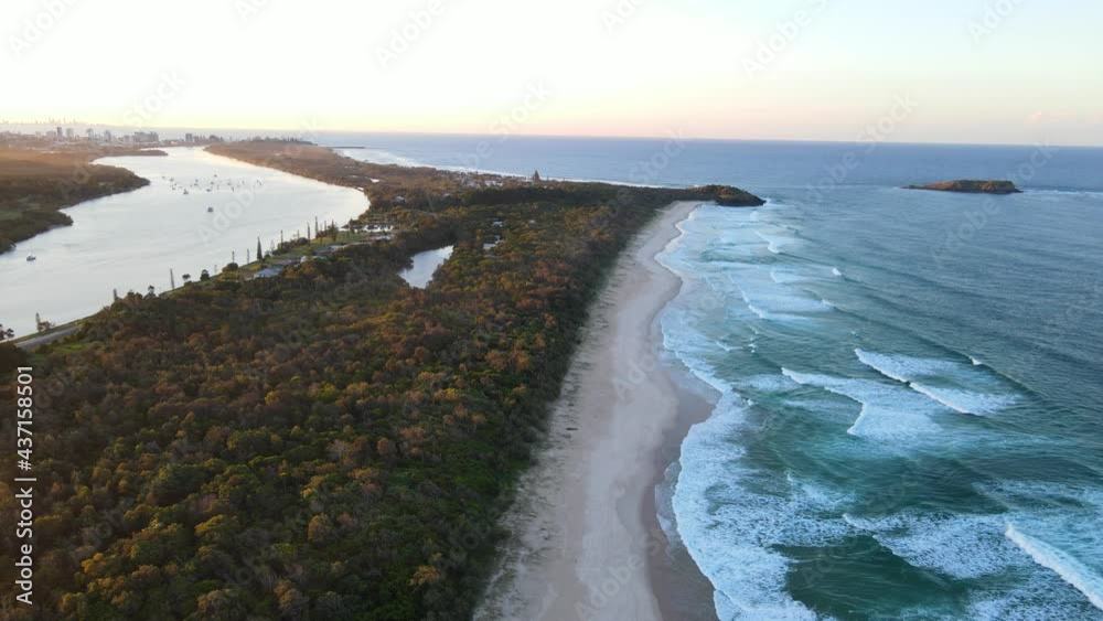 Ocean Waves At Dreamtime Beach Along Wommin Bay - Tweed River And Fingal Head At Sunset In New South Wales, Australia. - aerial Ocean Waves At Dreamtime Beach Along Wommin Bay - Tweed River And Fingal Head At Sunset In New South Wales, Australia. - aerial