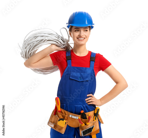 Young female electrician wi...