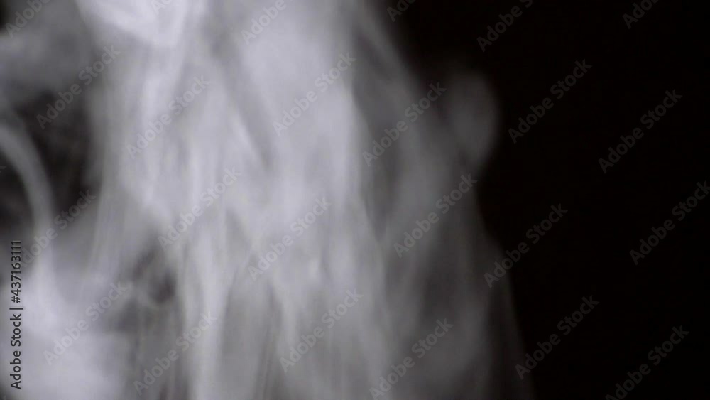 Abstract White Smoke On Black Background - studio shot Abstract White Smoke On Black Background - studio shot