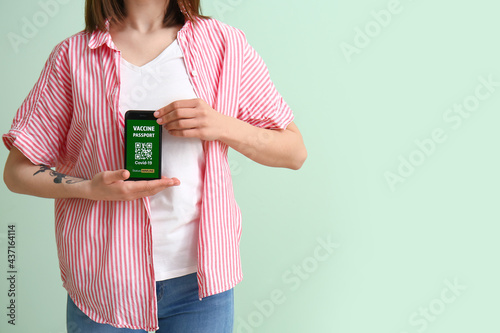 Young woman with electronic...