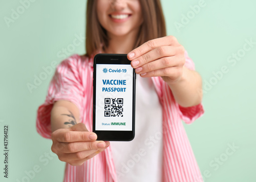 Young woman with electronic...