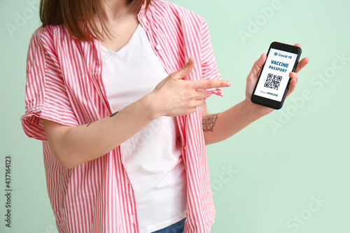 Young woman with electronic...