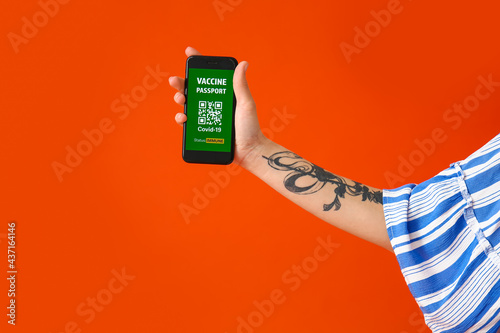 Young woman with electronic...