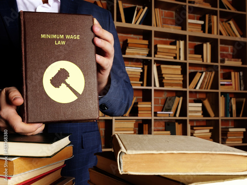 Принти на полотні MINIMUM WAGE LAW inscription on the sheet