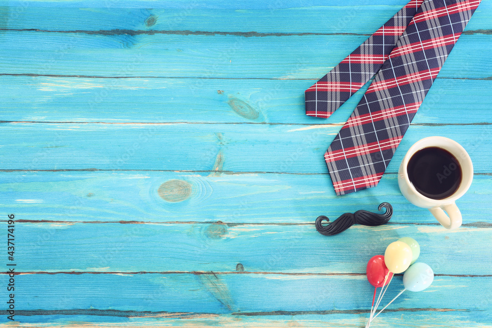top view image of fathers day composition with vintage father's accessories over blue background top view image of fathers day composition with vintage father's accessories over blue background