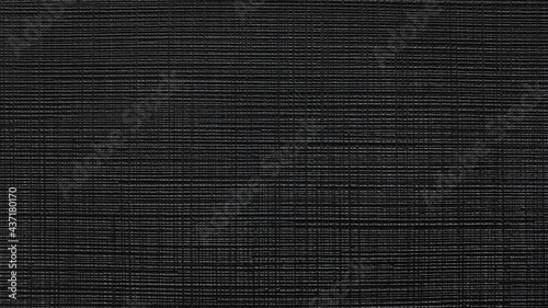 black textile fabric wallpaper texture background for interior wall covering. grunge canvas fabric background.