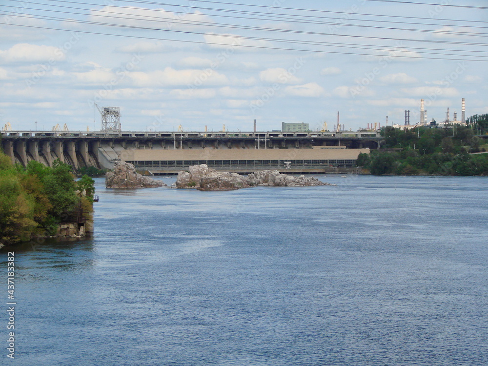 Landscape of the Dnieper current, which flows from the height of the Zaporozhye dam and bypasses the rocky rapids.