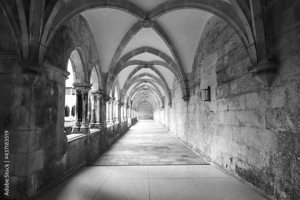 Archway of an old monastery. Cloisters of Batalha Monastery