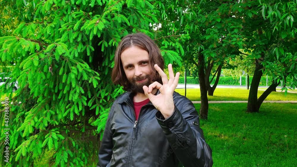 Man shows okay sign. Gestures and Language of body Man shows okay sign. Gestures and Language of body