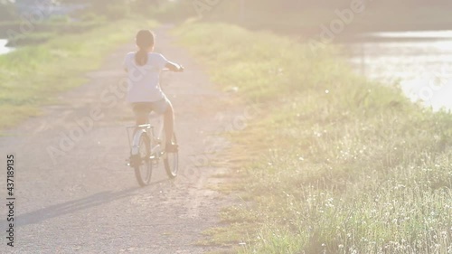 A riding bicycle in a rural