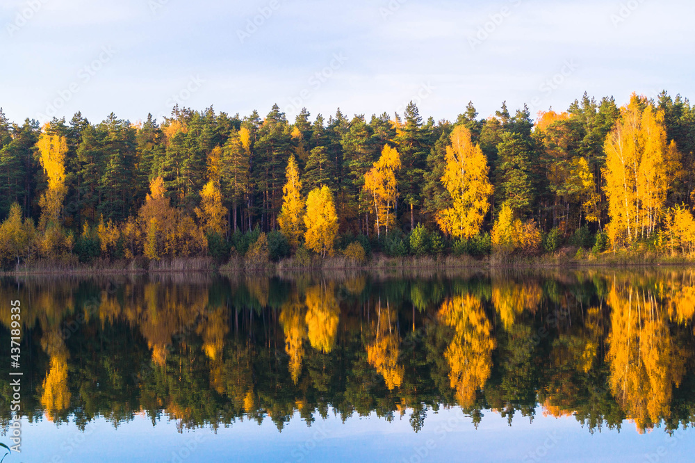 Beautiful forest lake old quarry on a clear autumn day. Forest gave. Beautiful forest lake old quarry on a clear autumn day. Forest gave.