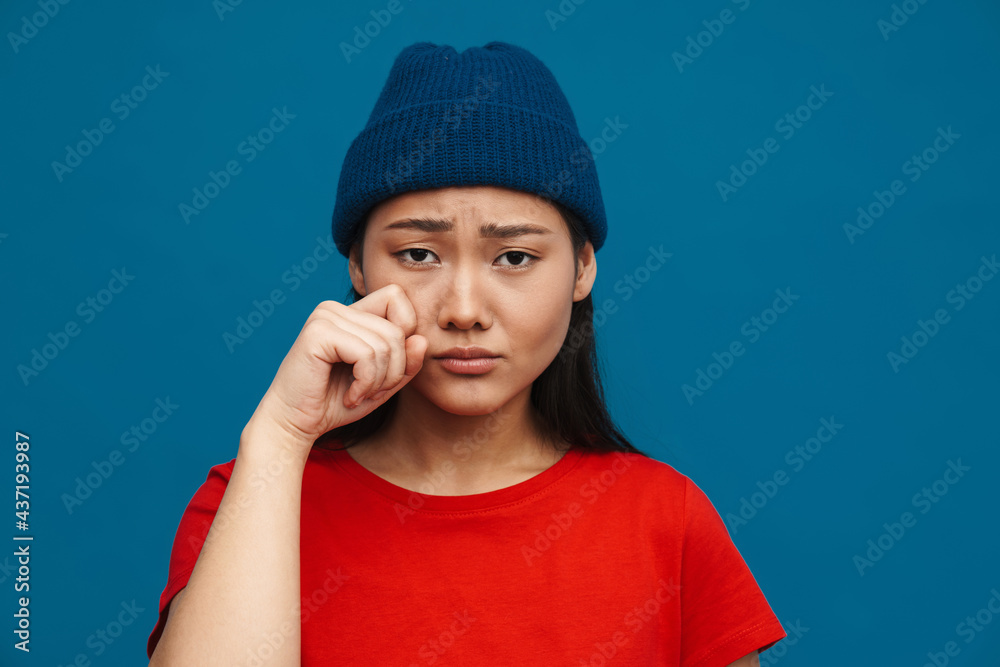 Happy young asian woman in casual clothes standing Happy young asian woman in casual clothes standing