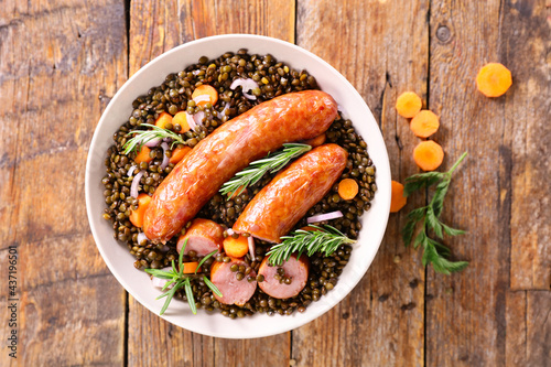 Fototapeta Naklejka Na Ścianę i Meble -  lentils with sausage and carrot