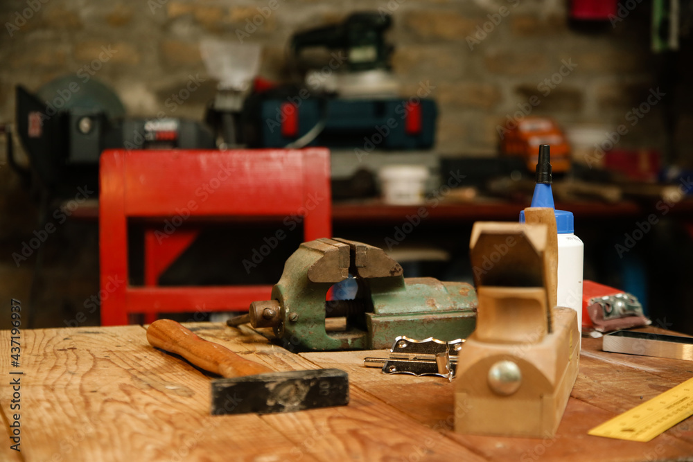 Workshop with tools on the wooden table Workshop with tools on the wooden table