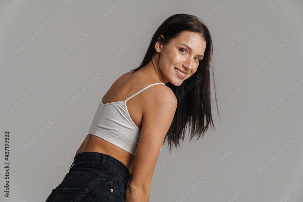 Smiling young white woman with long brunette hair Smiling young white woman with long brunette hair