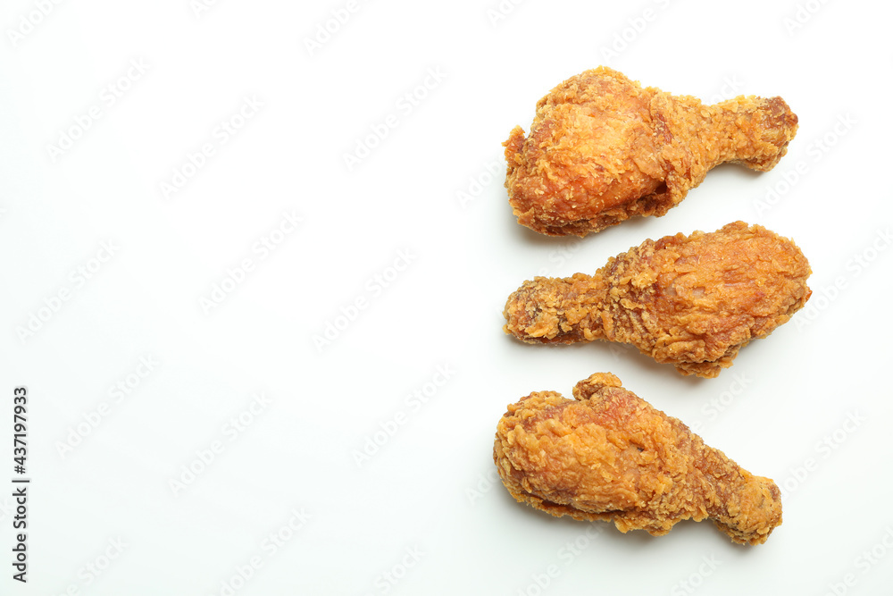 Tasty fried chicken on white background, space for text Tasty fried chicken on white background, space for text