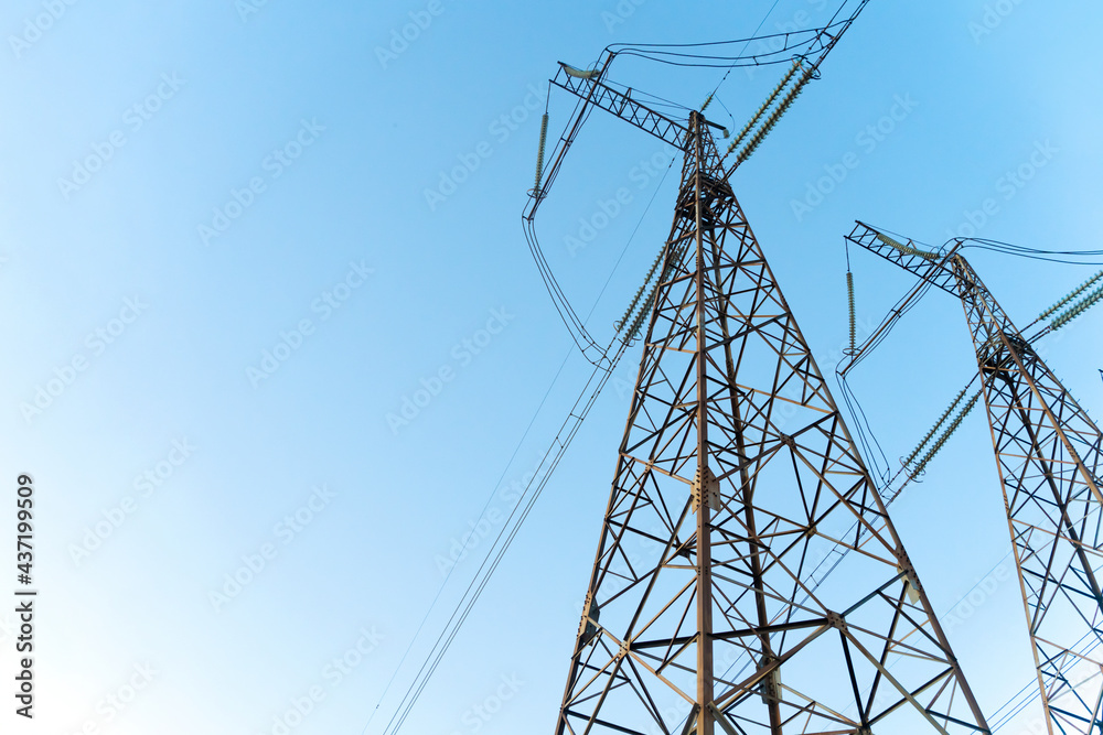 Power line stations against a blue sky Power line stations against a blue sky