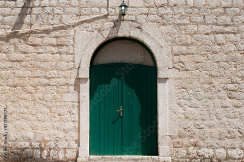 Green Door and Old Wall in Kotor, Montenegro © Tokil Photography