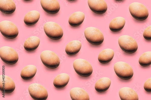 set of repetead eggs on pink background 