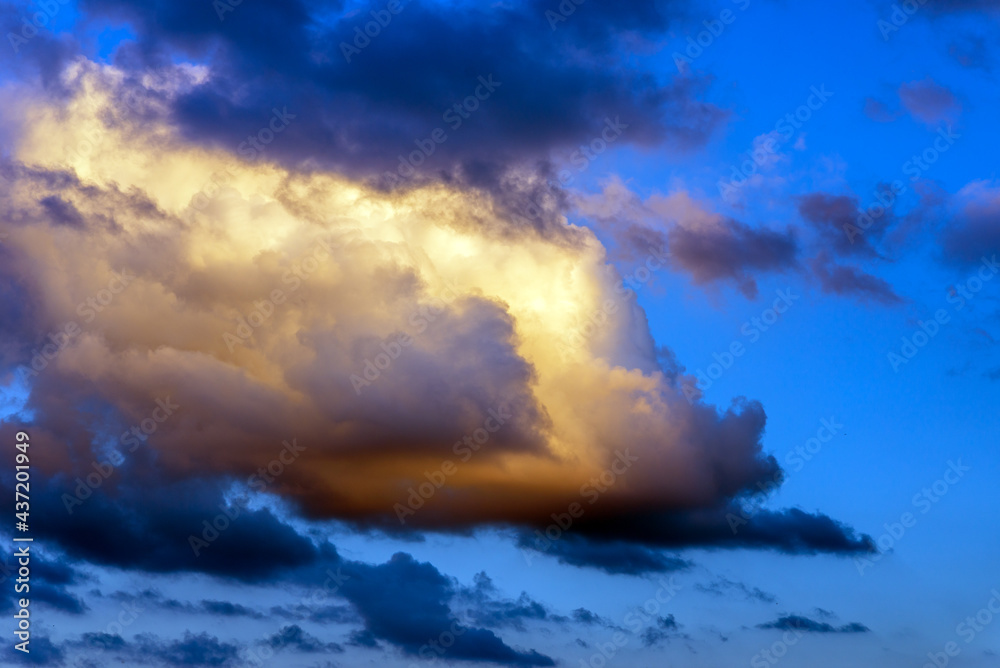 Beautiful sunset evening orange, yellow and dark clouds.Sunset evening cloud,golden cloud.Nice background.