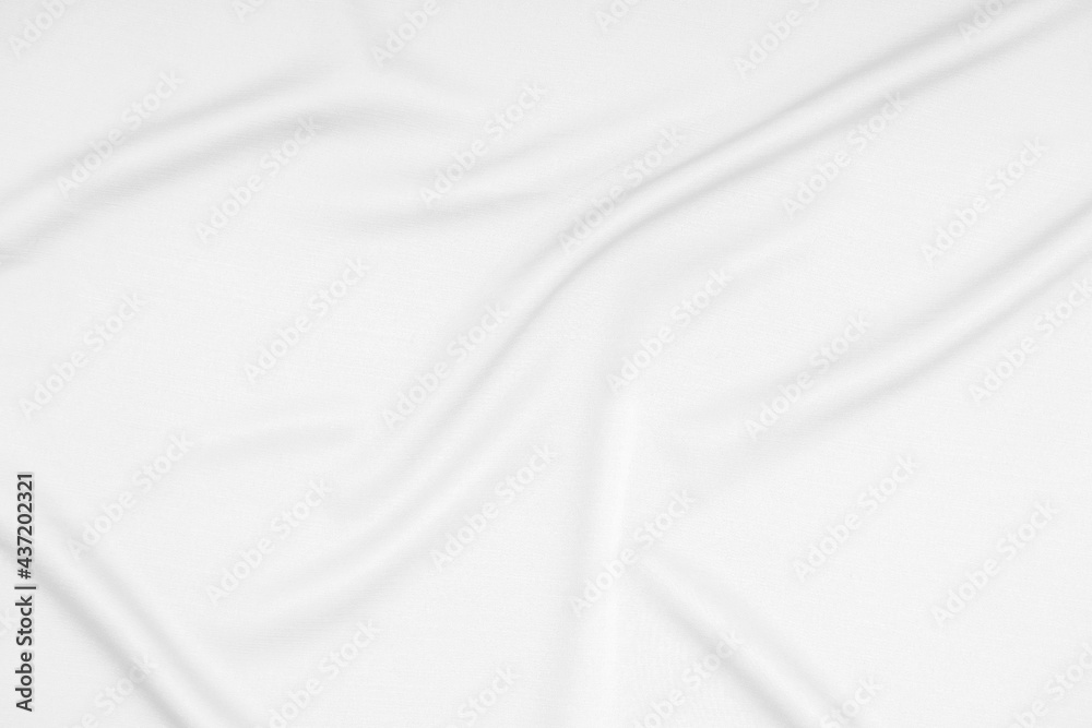 Abstract soft waves of white silk fabric, satin, cloth surface, white fabric texture background.