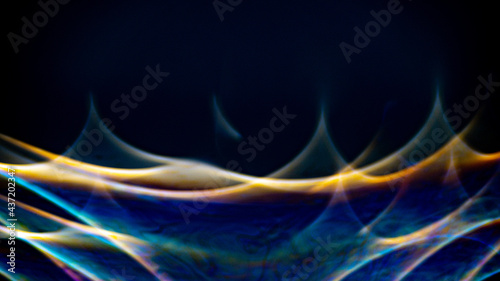 Abstract photo in red, green, yellow, magenta, pink, blue tones and dark background.