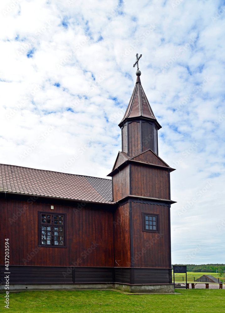 Built in 1925, a historic wooden Catholic church dedicated to Saint Roch in the village of Leman in Podlasie, Poland. There is also a historic wooden belfry next to the church.