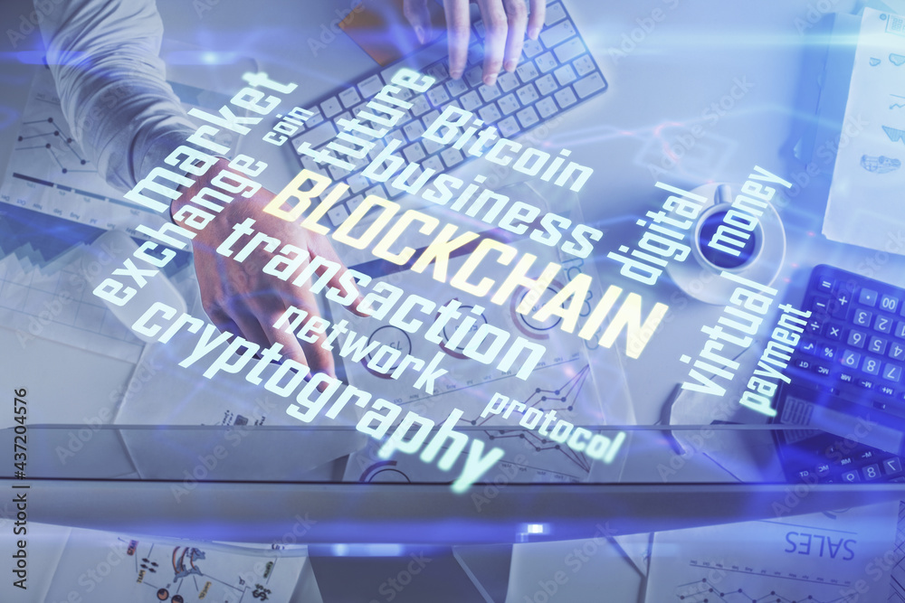 Double exposure of man's hands typing over computer keyboard and crypto currency theme hologram drawing. Top view. Blockchain concept. Double exposure of man's hands typing over computer keyboard and crypto currency theme hologram drawing. Top view. Blockchain concept.