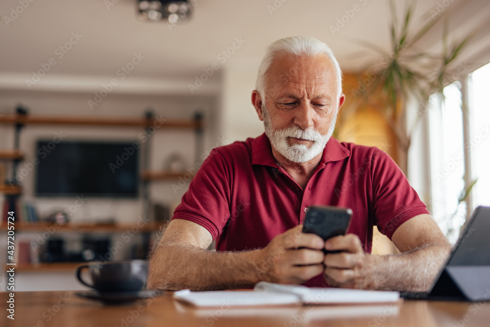 Senior man, emptying his spam folder. Senior man, emptying his spam folder.
