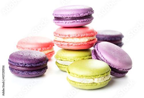 heap of French macarons isolated on white background photo