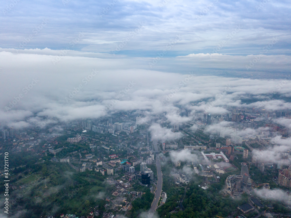 View of Kiev above the clouds at dawn. Aerial drone view. View of Kiev above the clouds at dawn. Aerial drone view.