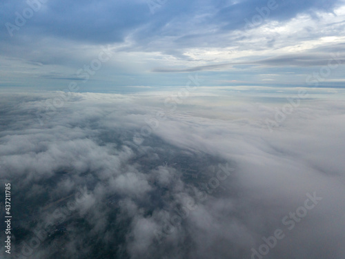 View of Kiev above the clouds at dawn. Aerial drone view.