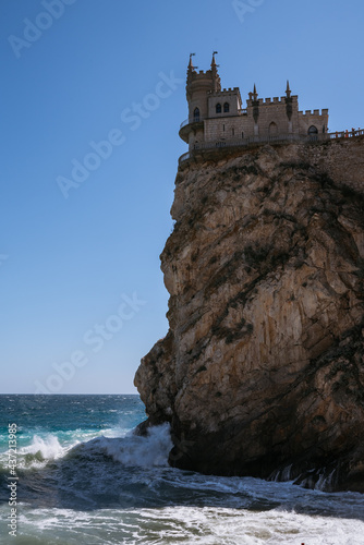 Yalta, swallow's nest , Rough sea with waves crashing against cliffs in Crimea