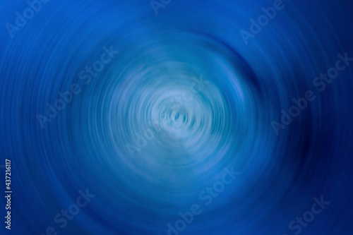 Flowing blue background with continuous circular lines for graphics.