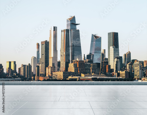 Empty concrete seafront on the background of a beautiful Manhattan city skyline at sunrise  mockup