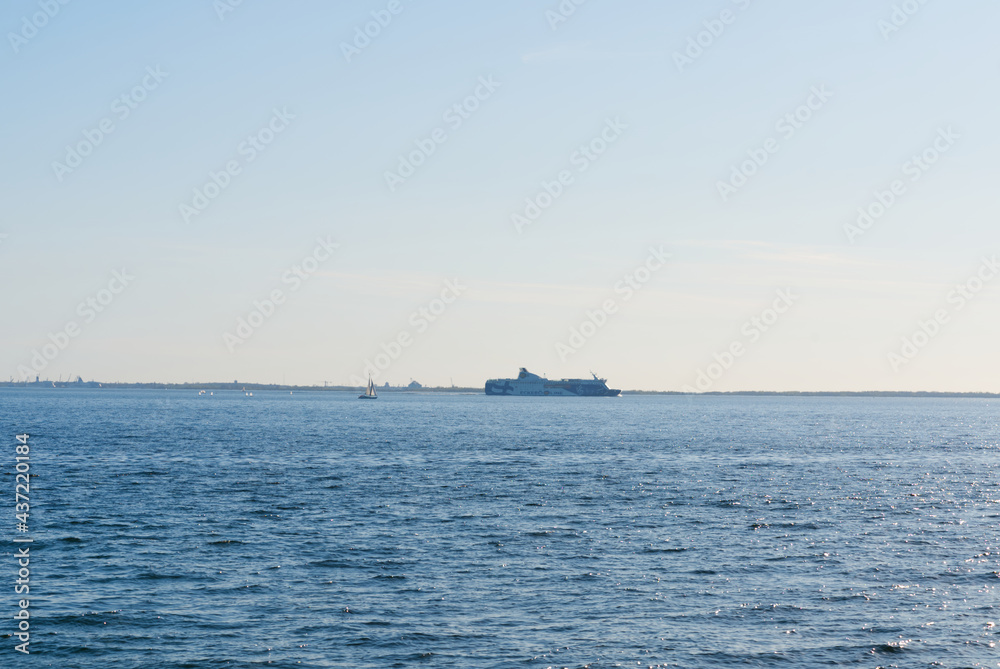 Nice cruise ferry sailing to the horizon in the Baltic Sea