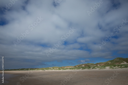 Dunes and clouds at nortsea coast. Julianadorp Netherlands. Beach