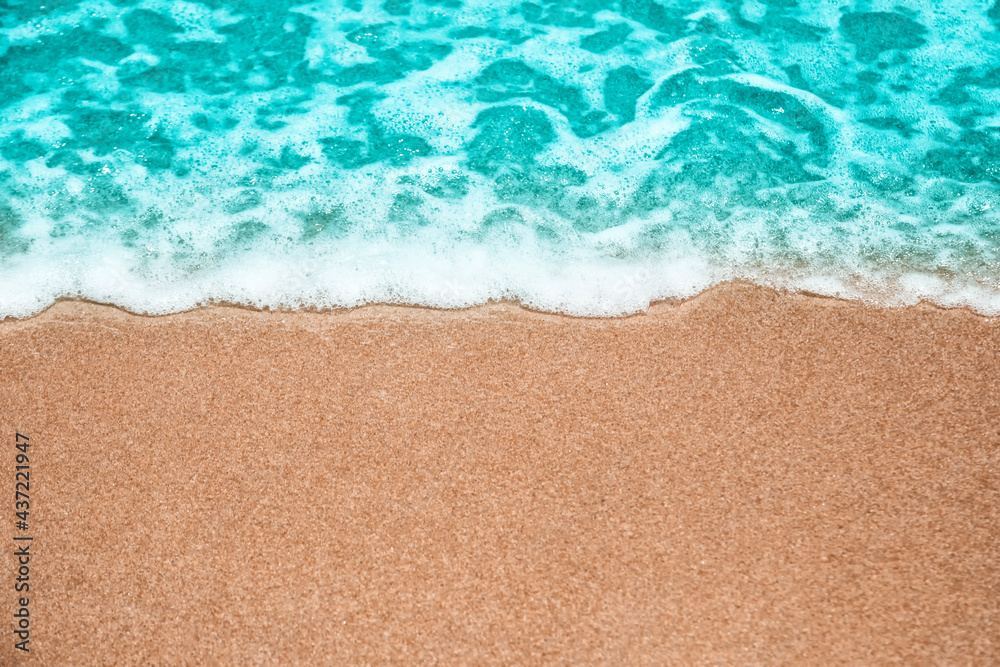 Abstract summer background, Soft wave-covered sand beach with blue water. Abstract summer background, Soft wave-covered sand beach with blue water.