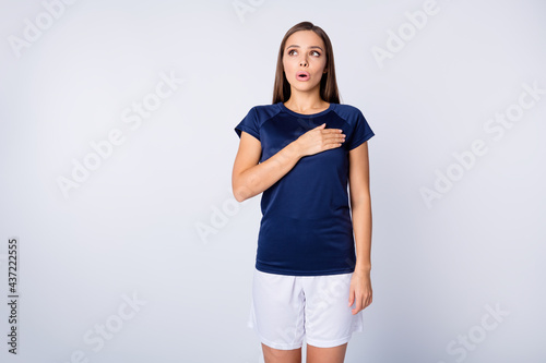 Portrait of her she nice-looking attractive lovely pretty serious straight-haired girl holding hand on heart swearing praying saying speech isolated over light white gray pastel color background