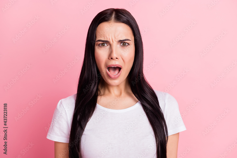 Fototapeta premium Portrait of attractive devastated girl bad terrible news reaction isolated over pink pastel color background