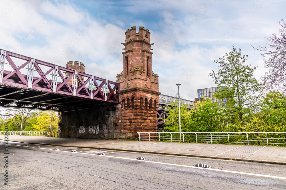 A view of the Gothic features of the City Union Railway Bridge in Glasgow on a summers day