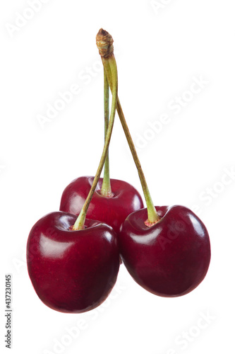 Three sweet cherries isolated on white
