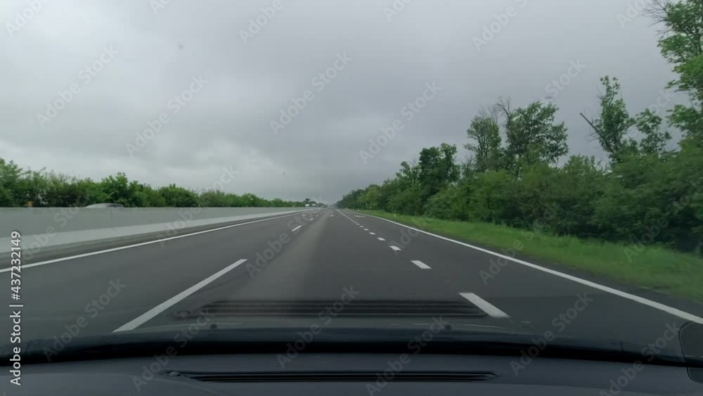 Driving on a fast road on a cloudy day