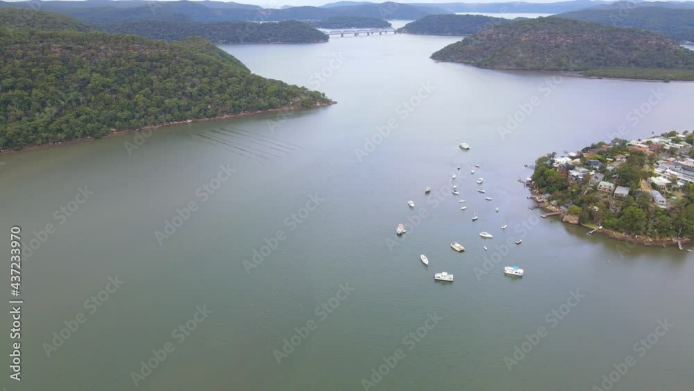 Boats In Mooney Mooney Creek Near Wharf - Spectacle Island In New South Wales, Australia. - aerial Boats In Mooney Mooney Creek Near Wharf - Spectacle Island In New South Wales, Australia. - aerial